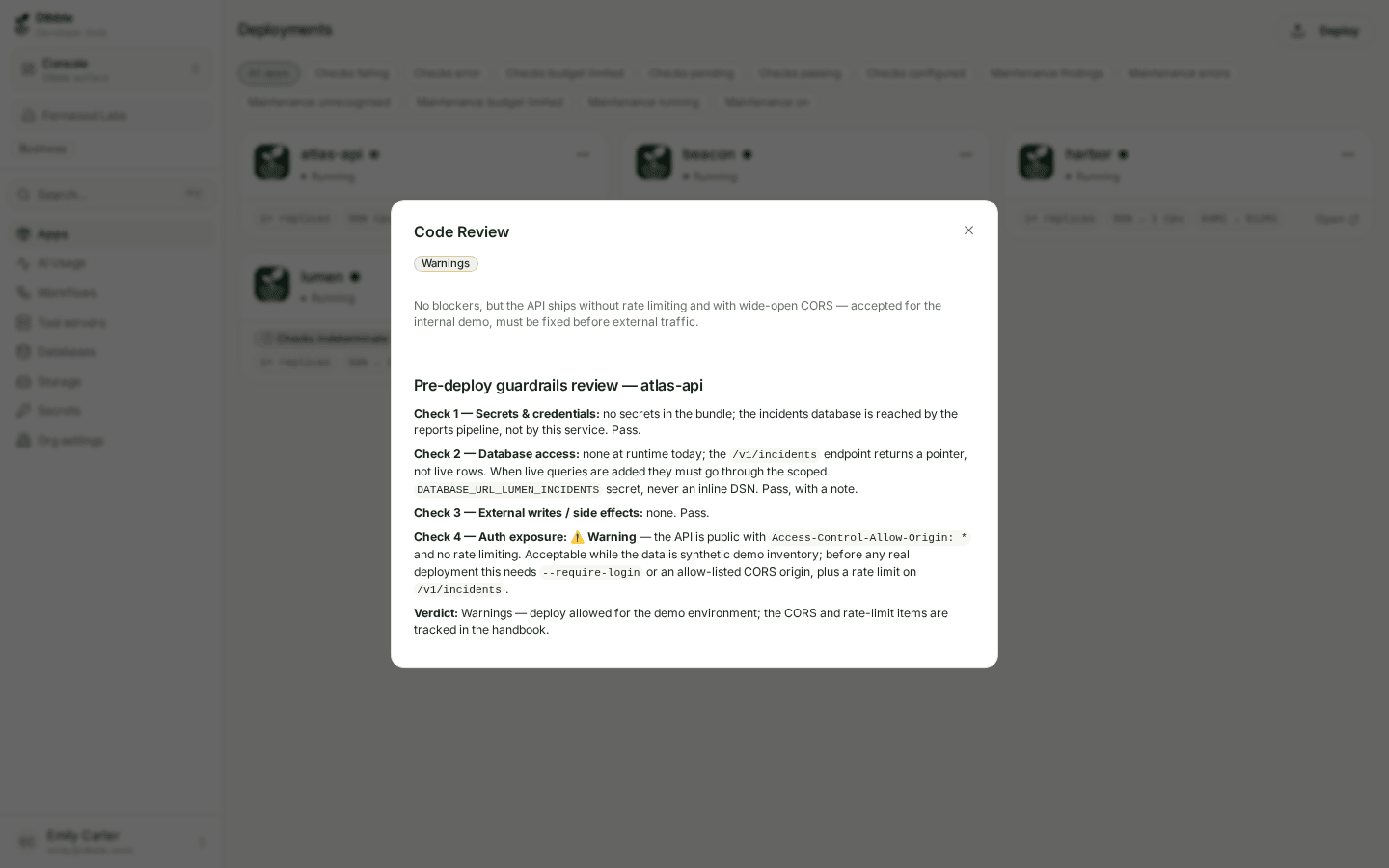 The Code Review dialog showing a Warnings status, its summary, and the full report body